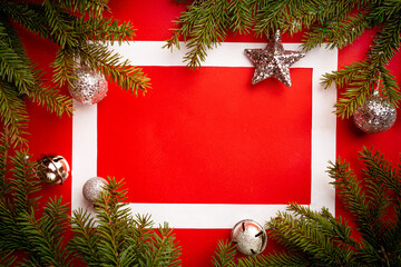 Fototapeta na wymiar Christmas holidays composition on red background with copy space for your text