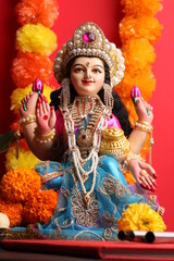 Fototapeta premium Idol worshipping of Hindu Goddess Lakshmi - Lakshmi Puja is a Hindu religious festival