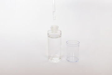 Dropper glass Bottle Mock-Up. Сosmetic pipette on white background