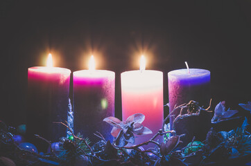 advent decoration with three burning candles - 388094788