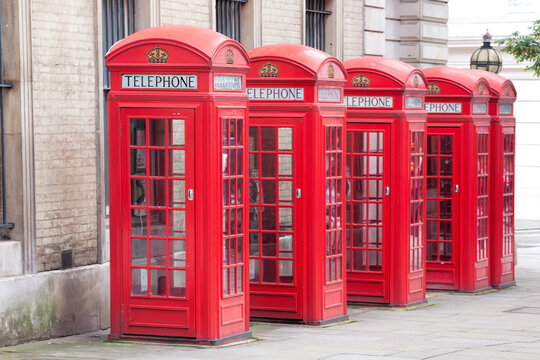 Famous red telephone booths in Covent Garden street, London, England