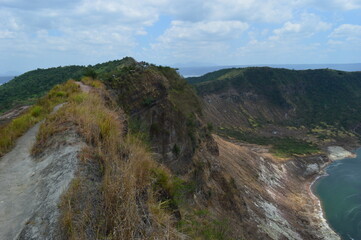 Sunset over the stunning beaches of the island of Boracay and hiking at the Taal Volcano lake in the Philippines
