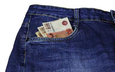 Russian paper money rubles in the pocket of blue jeans