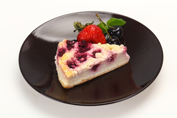 Cheesecake with cherry served strawberry