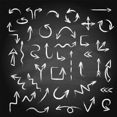 Hand drawn doodle arrows set made of chalk or pastel texture on a blackboard background.