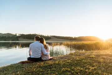 a couple in love on a walk in nature.Romance and love in the setting sun