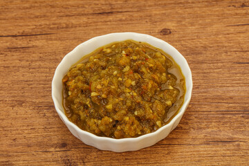 Green spicy sauce in the bowl