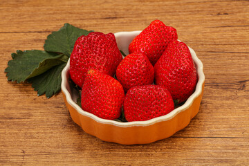 Ripe sweet strawberry with leaf
