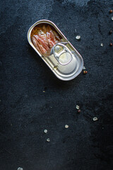 anchovies canned fish in a tin can seafood top view copy space for text food background rustic diet pescetarian