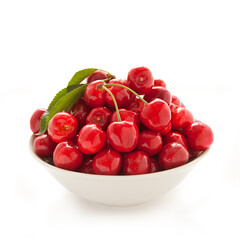 Fresh red cherry on the white background