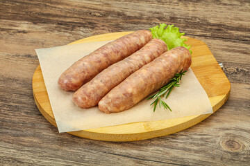 Raw pork meat sausages for grill