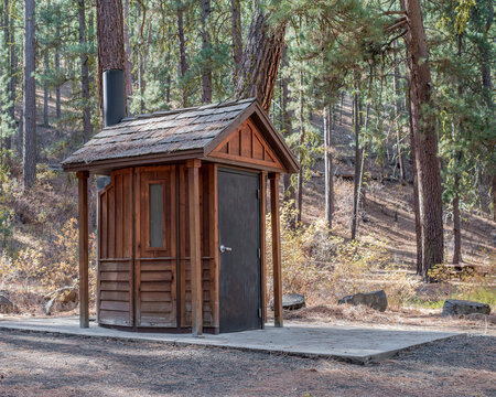 Rustic Wooden Vault Toilet that serves as the restroom facilities provided by the Forest Service at Drews Creek Campground