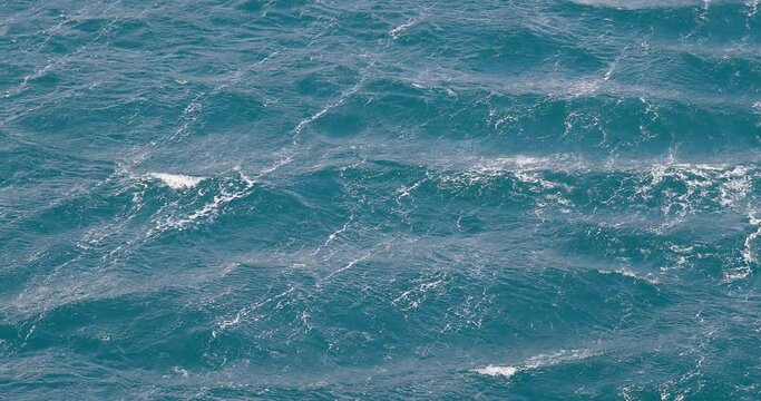 Waves on blue sea surface