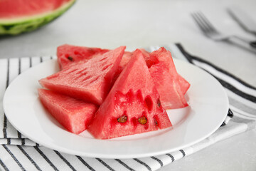 Yummy watermelon slices on white table, closeup