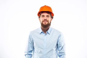 Man in working uniform orange hard hat lifestyle official