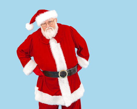 An angry Santa Claus isolated on blue.