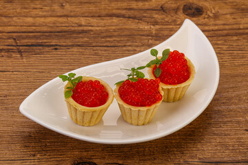 Apetizer - tartlet with red caviar