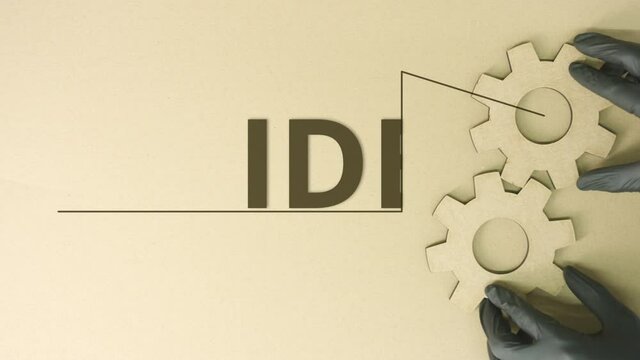 Idea word and cardboard gears