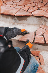 Professional installation of facing tiles - natural stone decor - exterior decoration