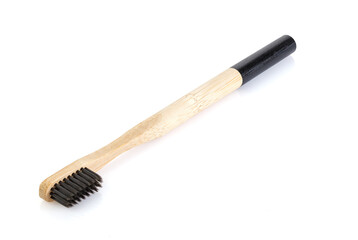 Natural eco friendly bamboo toothbrushes with charcoal bristles isolated on white background. Flat...