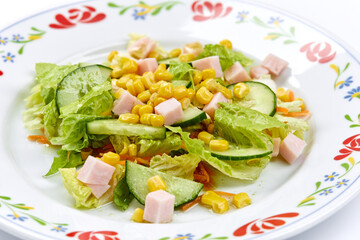 salad with ham on the white background