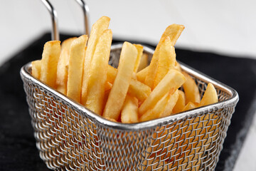 fried french fries in the basket
