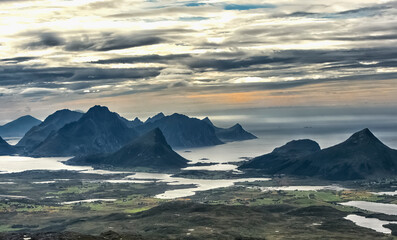 Lofoten is a chain of islands far north on the coast of Norway.  Lofoten is an absolutely incredible place. It's gorgeous and dramatic, with mountains growing straight out of the ice-cold waters.