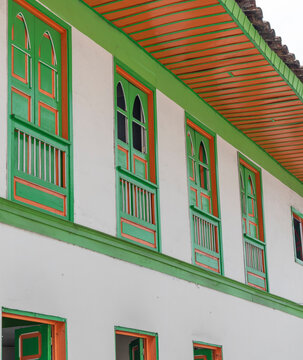 Balconies and windows of red, blue, green, yellow colors in the coffee region in Colombia