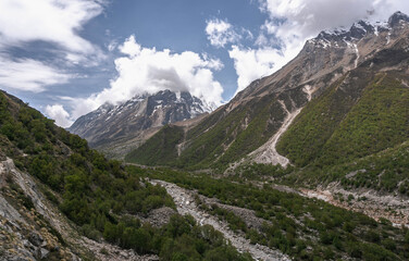 Gangotri is one of the main Hindu holy places of pilgrimage in the Himalayas. The trail from Gangotri to Gomukh runs between the mountain peaks.