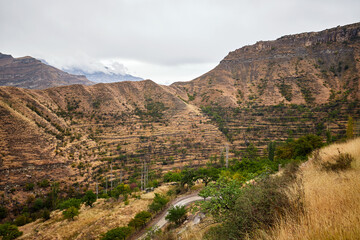 Obraz premium Traditional rural agriculture is the mountain terraces of Dagestan. Ethnic culture, manual labor