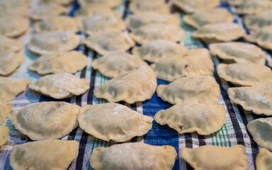 Obraz premium Traditonal Polish food called pierogi in raw form