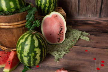 slices of watermelon. red sliced watermelon. watermelon on a brown background
