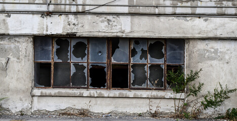 broken window in a abandoned factory
