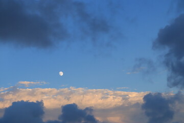 Evening sky with moon and clouds