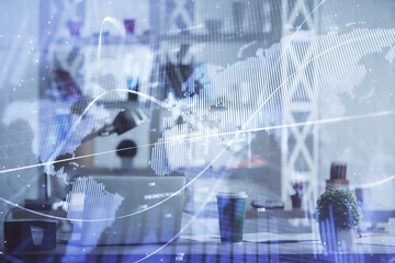 Double exposure of stock market graph drawing and office interior background. Concept of financial analysis.