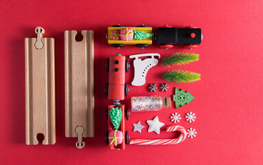 Top view layout with new year christmas toy trains, fir trees, toys - knolling, Christmas card