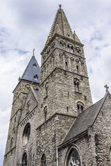 Fototapeta na wymiar St. James' Church (Sint-Jacobskerk) features two attractive towers from the Romanesque period, its one of the oldest churches of Ghent. Belgium.