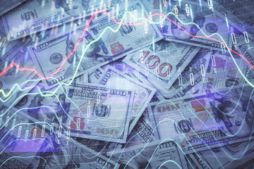Double exposure of forex graph drawing over us dollars bill background. Concept of financial markets.