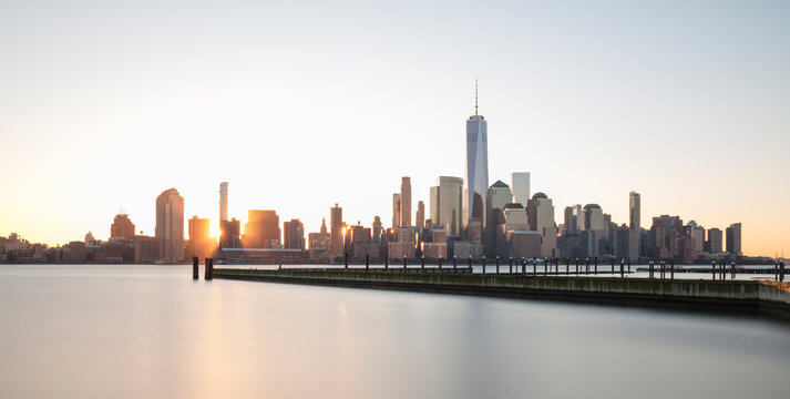 USA, New York, New York City, Lower Manhattan skyline with One World Trade Center at sunrise