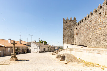 a cobbled street at the entrance gate to the castle of Trancoso city, Guarda district, Beira Alta, Portugal