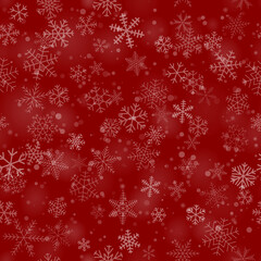 Christmas seamless pattern of snowflakes of different shapes, sizes and transparency, on red background