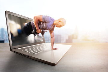 Personal trainer does gym lesson through internet and laptop