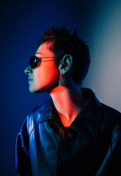 Mysterious model in cyberpunk styled outfit
