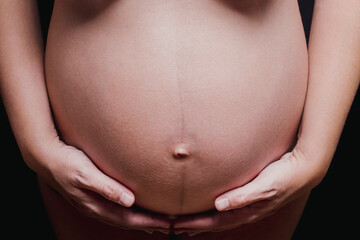 Anonymous detail of pregnant woman