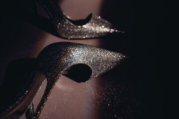 Fancy shoes in dark room