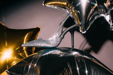 Trendy shoes on balloons during party