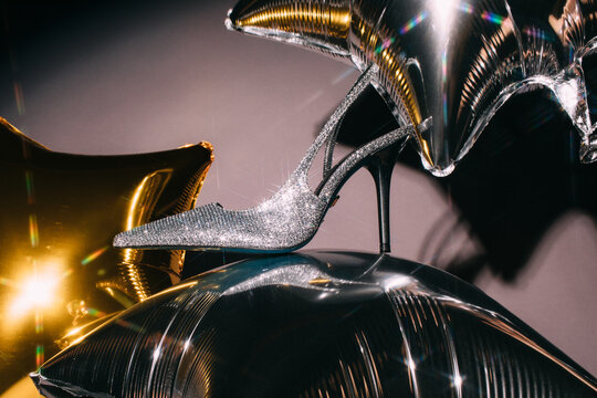 Trendy shoes on balloons during party