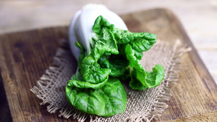 Raw bok choy cabbage on a wooden surface. Healthy food.
