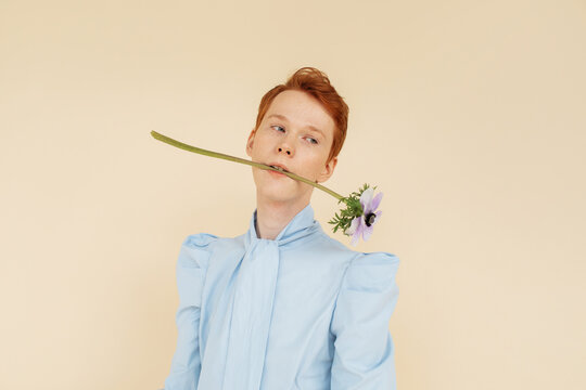 Fashionable male model with flower