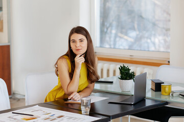 Architect sitting at desk in office